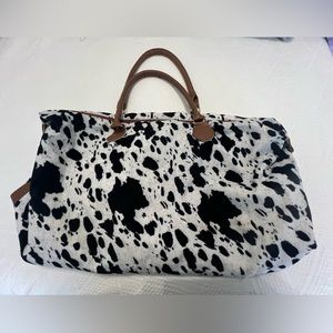 Cow print weekender bag
